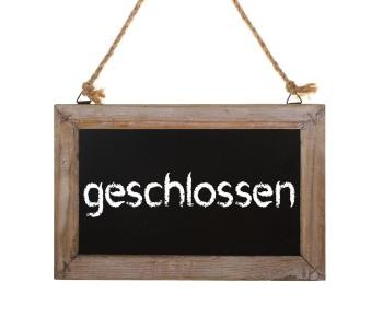 Bild Schild mit Aufschrift geschlossen